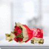 Elegant Bouquet with 1 White Oriental Lily, 10 Red Roses, 5 Pink Carnations & 16 Ferrero Rocher Chocolates